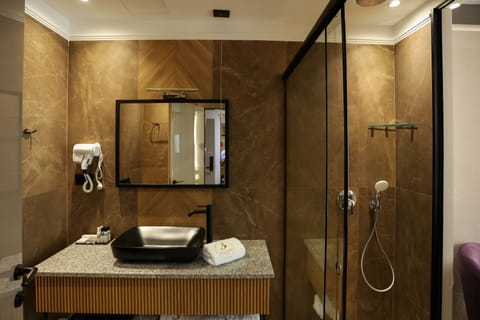 Deluxe Family Room, Sea View | Bathroom | Bathrobes, slippers, towels