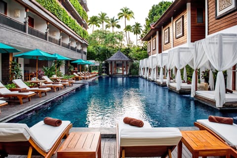 Outdoor pool, pool umbrellas, sun loungers