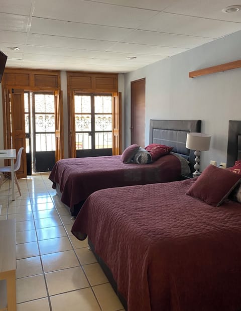 Standard Room | Premium bedding, pillowtop beds, individually decorated, desk