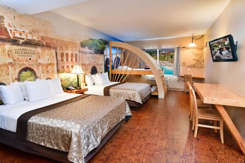 Desk, iron/ironing board, bed sheets