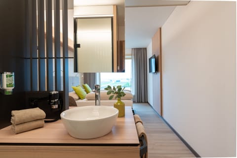 Shower, hydromassage showerhead, hair dryer, towels