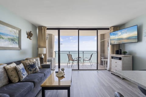 Signature Condo, 1 Bedroom, Balcony, Ocean View | Living room | 42-inch TV with cable channels