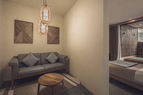 Suite Room | Living area | 50-inch LED TV with cable channels, Netflix, streaming services