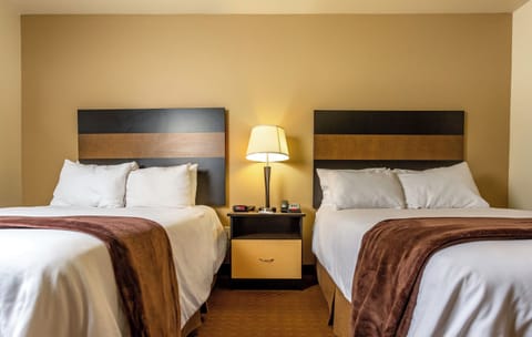 Premium bedding, pillowtop beds, desk, laptop workspace