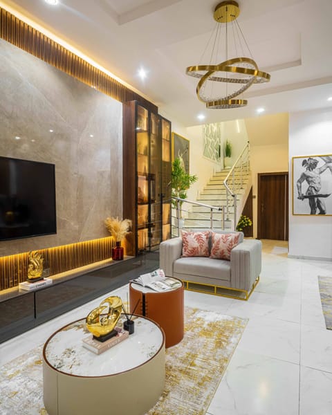 Luxury Duplex | Living room | 65-inch Smart TV with cable channels, TV, Netflix