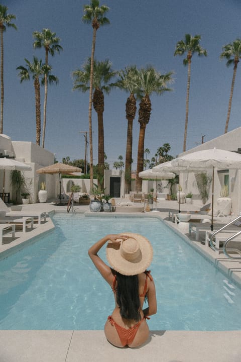 Outdoor pool, open 8:00 AM to 10:00 PM, free cabanas, pool umbrellas