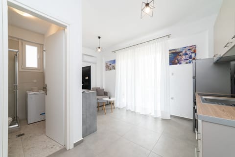 Apartment, 2 Bedrooms | Private kitchen | Full-size fridge, oven, stovetop, coffee/tea maker