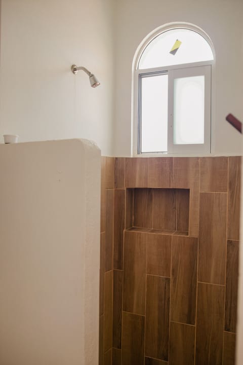 Standard Studio | Bathroom | Shower, rainfall showerhead, towels, soap