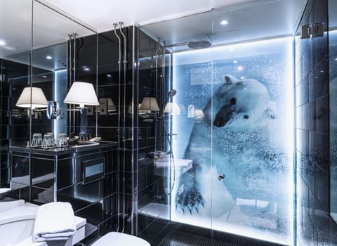 Designer toiletries, hair dryer, bathrobes, slippers