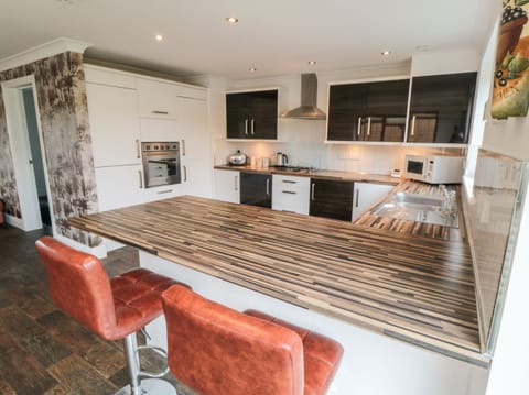 Fridge, electric kettle, toaster, cookware/dishes/utensils