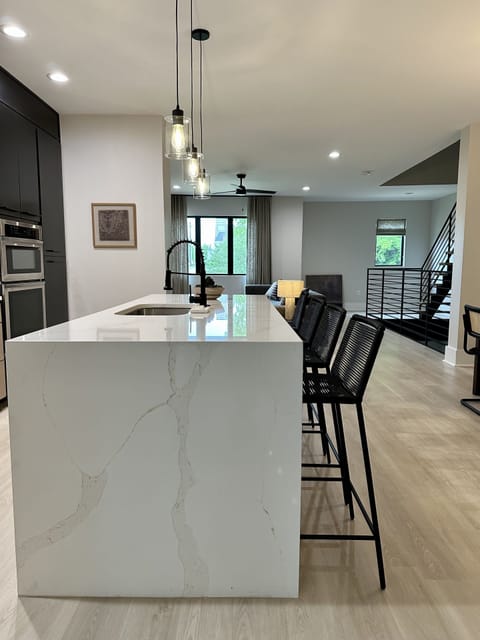 Luxury Townhome (4 Bedrooms) | Private kitchen | Coffee/tea maker, full-size fridge, microwave, oven