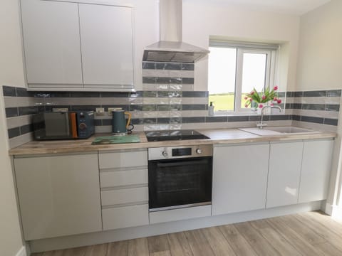 Fridge, electric kettle, toaster, cookware/dishes/utensils