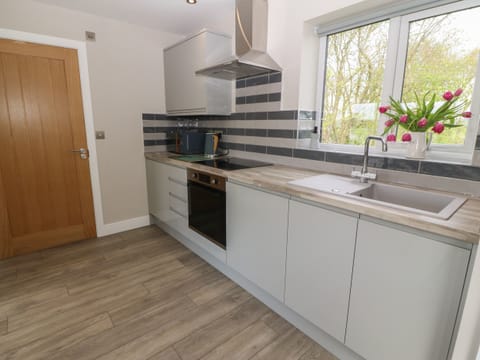 Fridge, electric kettle, toaster, cookware/dishes/utensils