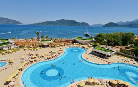 Indoor pool, outdoor pool, pool umbrellas, sun loungers