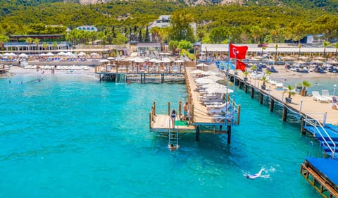 Private beach, free beach shuttle, free beach cabanas, sun loungers