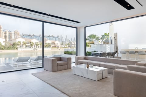 Exclusive Villa, 5 Bedrooms, Private Pool, Beachfront | Living area | 75-inch LED TV with satellite channels, TV, fireplace