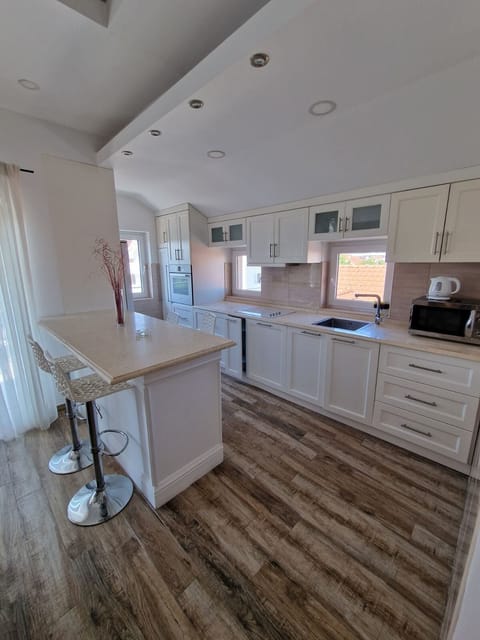 Executive Apartment | Living area | Smart TV, heated floors, printers