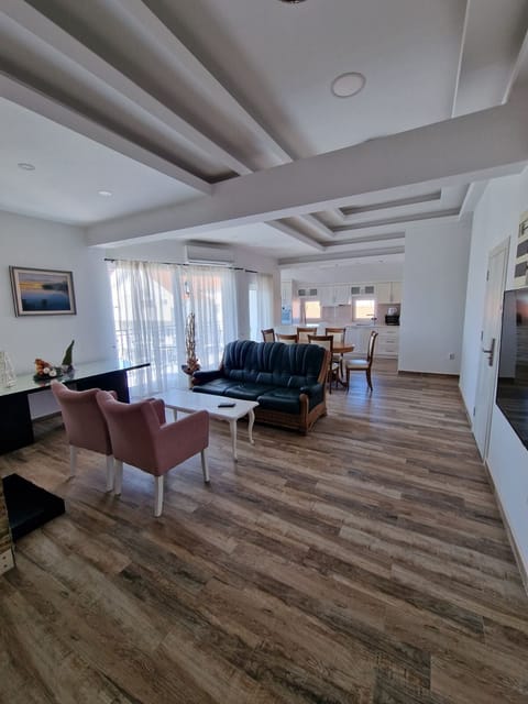 Executive Apartment | Living area | Smart TV, heated floors, printers