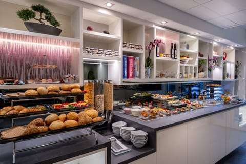 Daily buffet breakfast (EUR 18 per person)