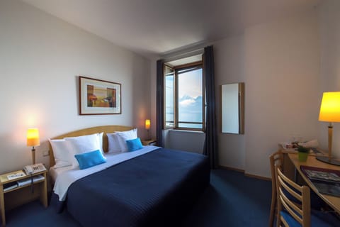 Standard Double or Twin Room, Lake View | Minibar, in-room safe, desk, blackout drapes