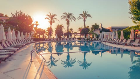 Indoor pool, seasonal outdoor pool, pool umbrellas, sun loungers