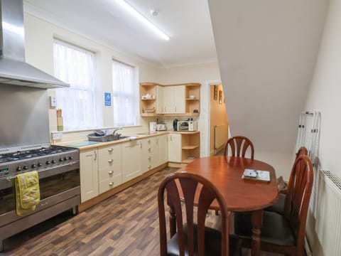 Fridge, electric kettle, toaster, cookware/dishes/utensils