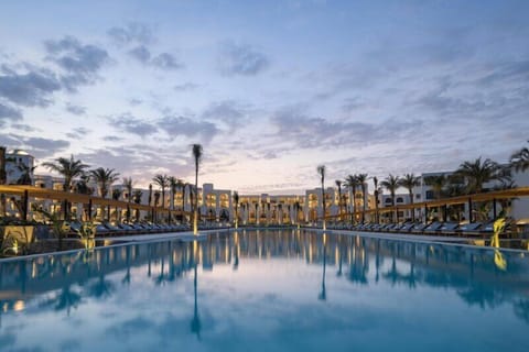 2 outdoor pools, pool umbrellas, sun loungers