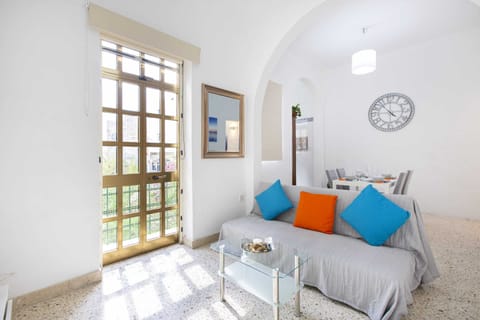 Basic Apartment, Multiple Beds | Living area | TV