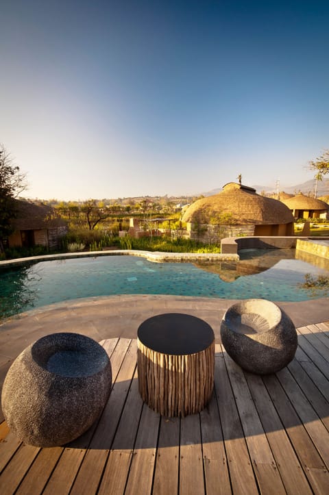 Outdoor pool, pool umbrellas, sun loungers