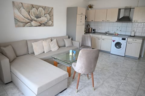 Deluxe Apartment | Living area | 140-cm Smart TV with cable channels, TV