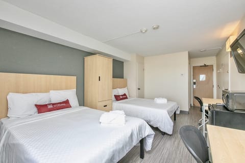 Economy Room, 2 Double Beds | Free WiFi, bed sheets