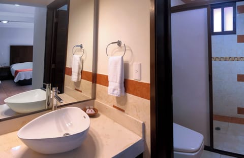 Shower, rainfall showerhead, towels, soap