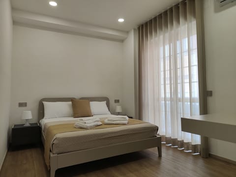 Comfort Quadruple Room | Down comforters, memory foam beds, minibar, individually decorated