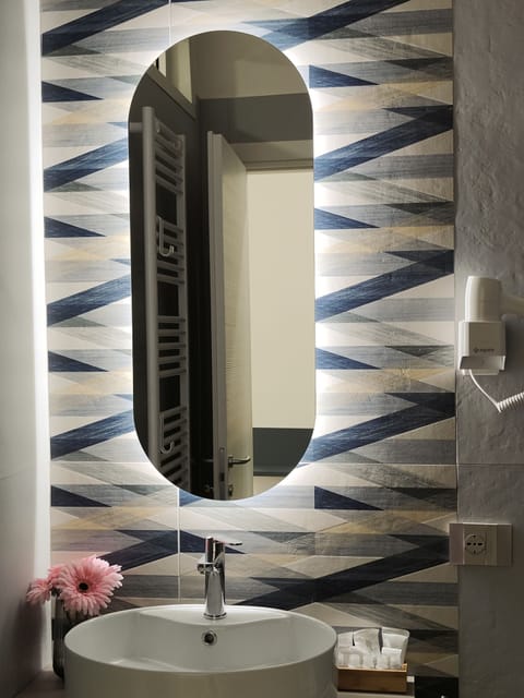 Comfort Quadruple Room | Down comforters, memory foam beds, minibar, individually decorated