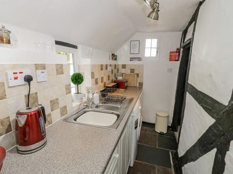 Fridge, electric kettle, toaster, cookware/dishes/utensils