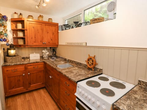 Fridge, dishwasher, electric kettle, toaster