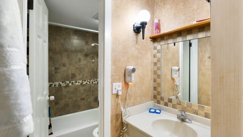 Room, 2 Queen Beds | Bathroom | Combined shower/tub, free toiletries, hair dryer, towels