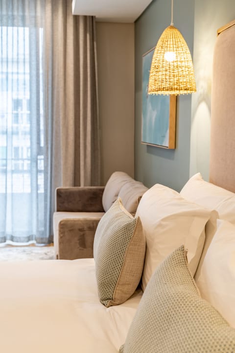 Luxury Suite, City View | Premium bedding, minibar, in-room safe, desk