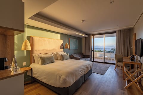 Luxury Suite, Sea View | Premium bedding, minibar, in-room safe, desk