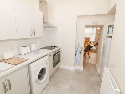 Fridge, electric kettle, toaster, cookware/dishes/utensils