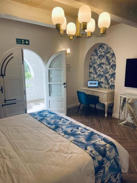 Superior Triple Room, 1 Bedroom, Garden View | In-room safe, individually decorated, desk, free WiFi