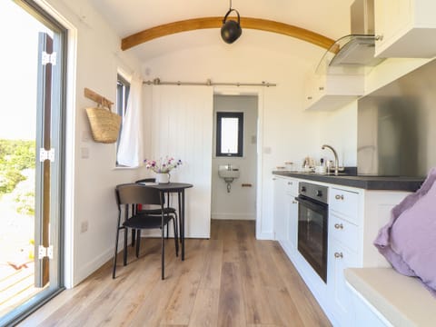 Fridge, electric kettle, cookware/dishes/utensils