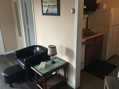 Family Apartment, Kitchenette, Lake View | Living area | TV