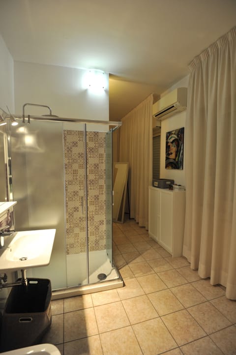 Quadruple Room, Balcony | Bathroom | Shower, free toiletries, hair dryer, bidet