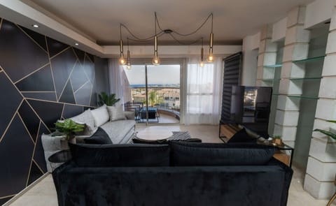 Apartment, Balcony | Living area | Flat-screen TV