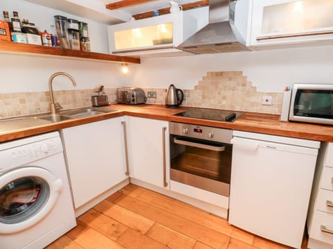 Fridge, electric kettle, toaster, cookware/dishes/utensils