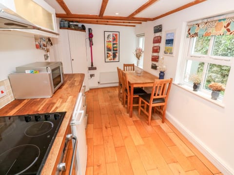 Fridge, electric kettle, toaster, cookware/dishes/utensils