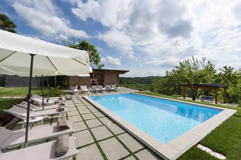 Seasonal outdoor pool, pool umbrellas, sun loungers