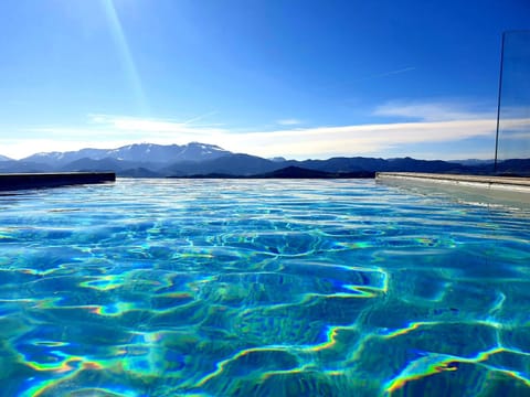 Indoor pool, outdoor pool, pool umbrellas, sun loungers