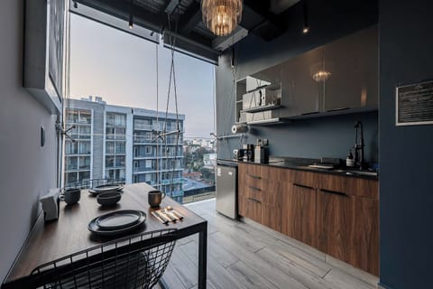 Deluxe Loft, 1 Queen Bed, Kitchenette, City View (2) | Private kitchen | Shared fridge, microwave, coffee/tea maker, electric kettle